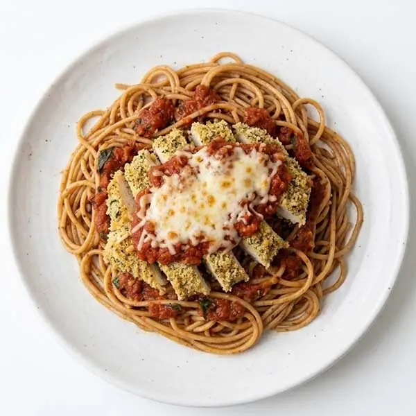 Baked Chicken Parmesan over Whole Wheat Spaghetti